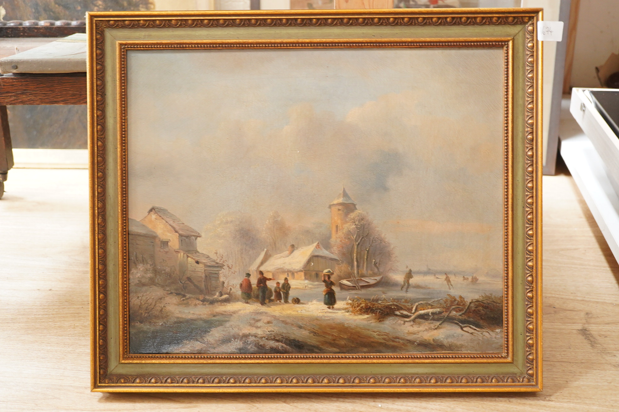 19th century Dutch School, oil on canvas, Skaters in a winter landscape, unsigned, 35 x 44cm, ornately framed. Condition - fair, craquelure throughout